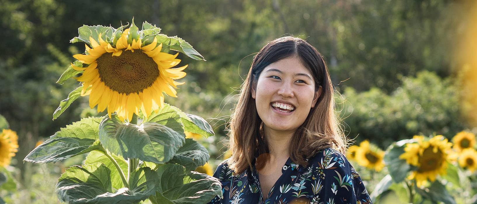 woman with sunflowers